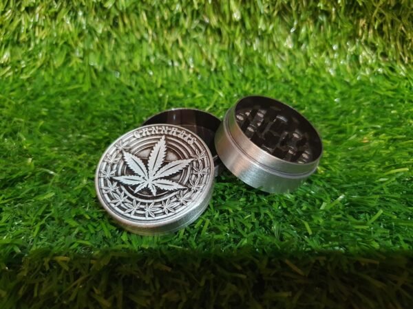 WhatsApp Image 2025-06-19 at 14.16.46_14db4578 Spice 1.6 Inch 4 Part Top Cannabis engraved Metal Grinder